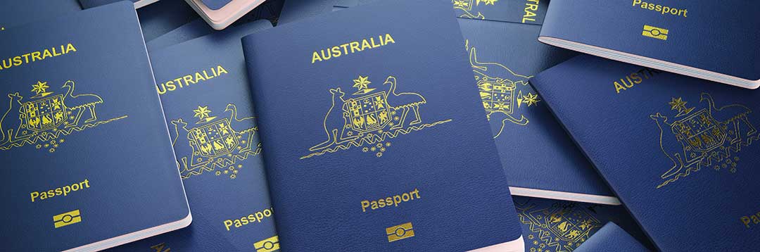 Austrailian passports denoting Austrailian citizenship are shown to emphasize the citizenship requirement.
