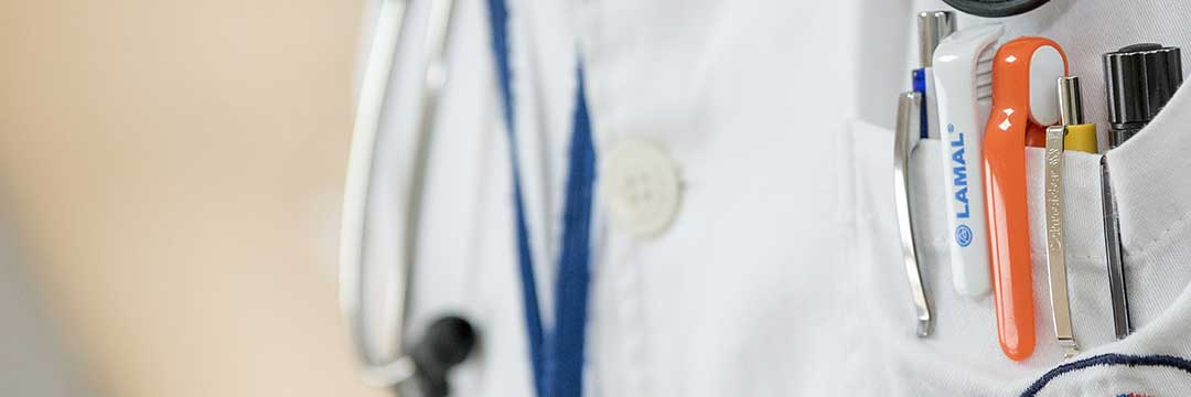 A doctor's white coat, to signify a doctor's testimony.