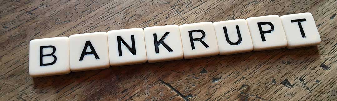 Scrabble pieces spelling out the word bankrupt, as legal separation's consequences can be quite draconian.
