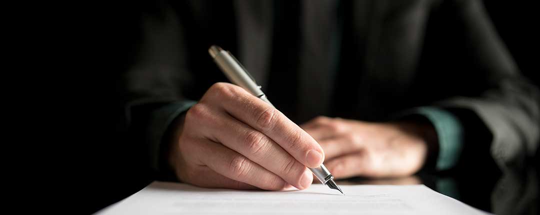 A signature on a will must be one created without trickery.
