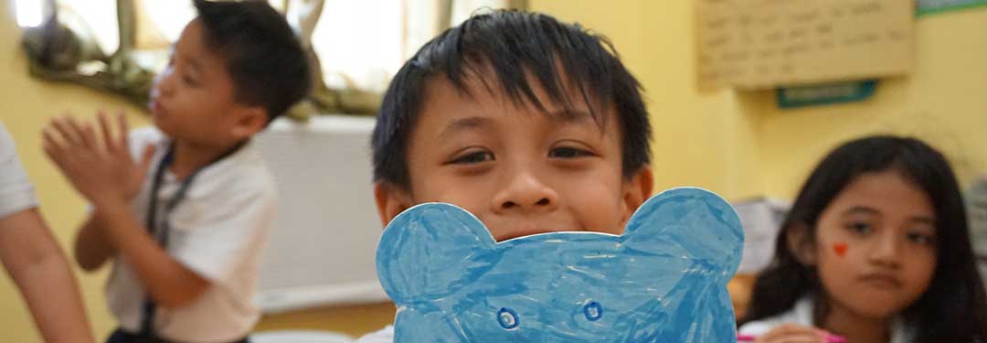 A photo of a young filipino boy holding a paper blue bear, with two other children in the background. Will my children's inheritance be affected by a Judicial Separation of Property?
