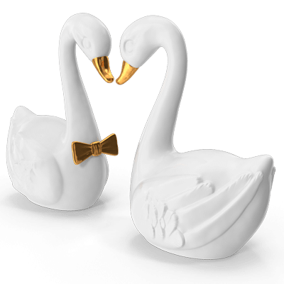 Two white swans wedding cake topper symbolizing marriage. Article: Recognition of Foreign Divorce In The Philippines (Process) by Lawyers in the Philippines FCB Law