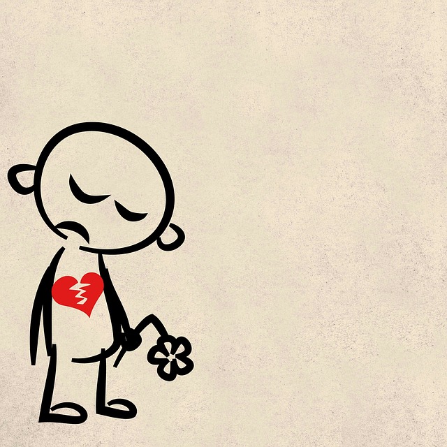 A drawing of a sad boy with broken heart