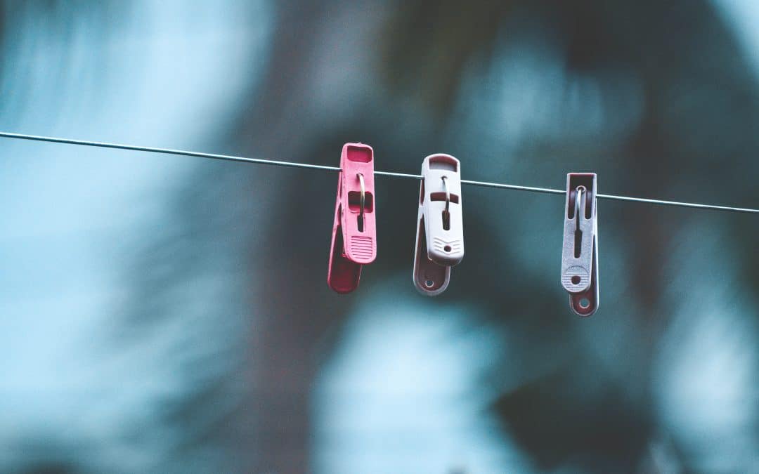 3 cloth clips on a wire