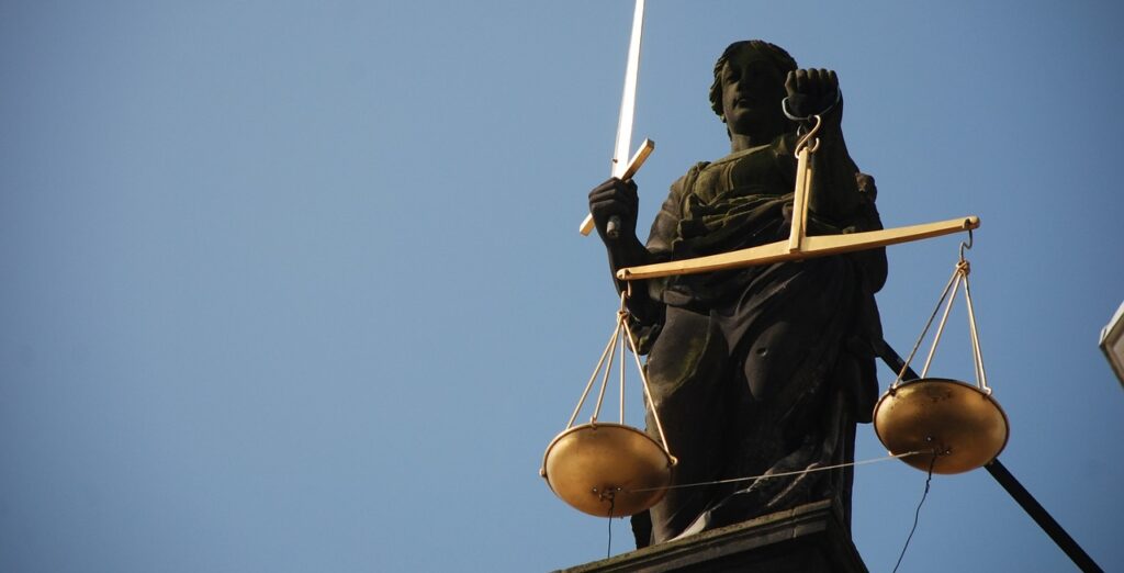 Lady justice under a clear sky