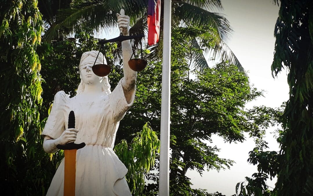 Photo of a statue of justice holding a sword and a set of scales. How to file Annulment in the Philippines from Abroad