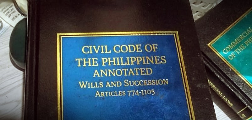 A Civil Code of the Philippines book.
