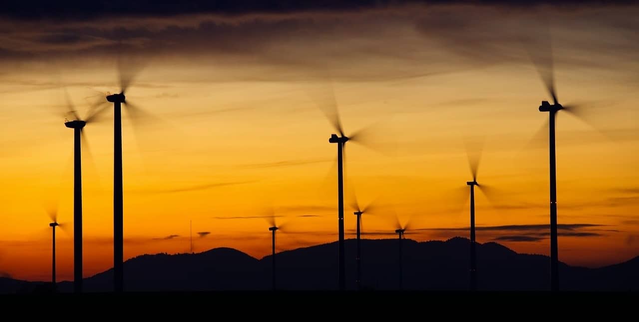 Wind turbines on a sunset