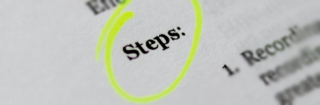 A picture of the word "steps" written on a paper