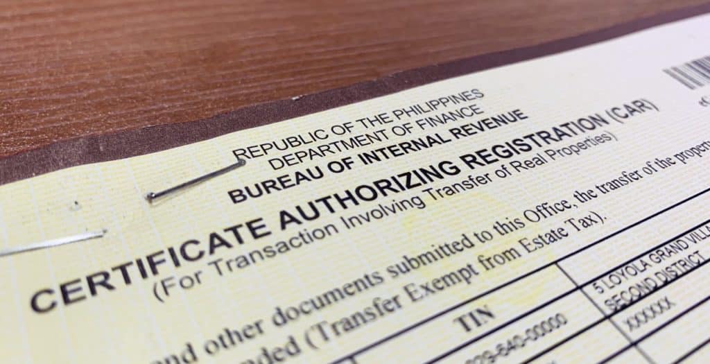 A macro shot of Certificate Authorizing Registration for BIR ruling on a tax free exchange.