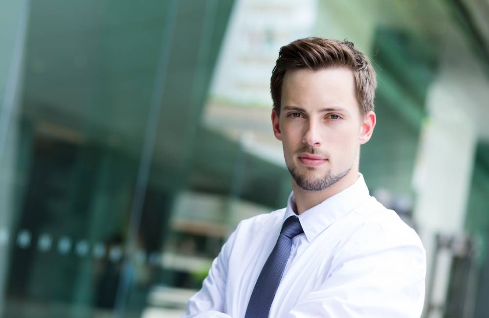 A young American businessman symbolizing the fact that a Branch Office is fully contrlled by the foreign parent.