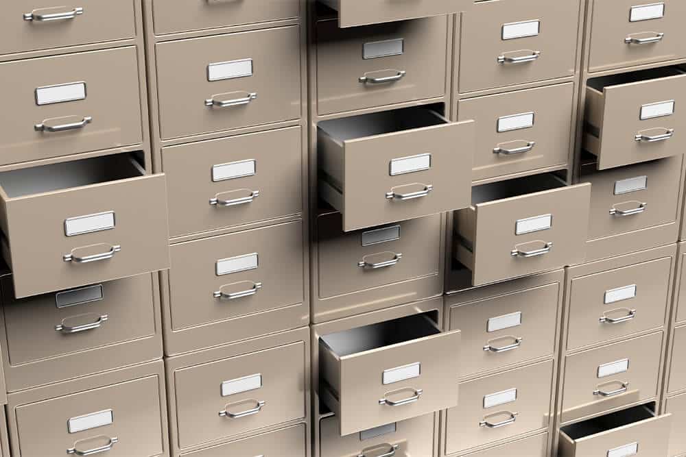 A will needs a lot of porperty and family documents which are contained in a large brown filing cabinet.