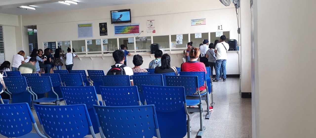 People transacting in a government office