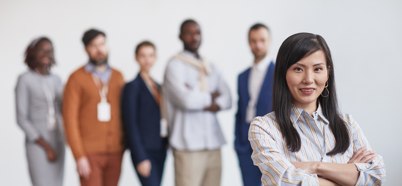 A woman standing in front of a group