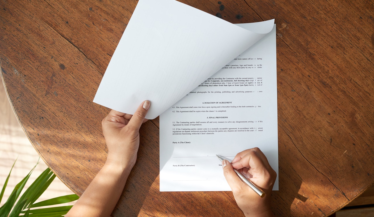 A person signing a petition paper