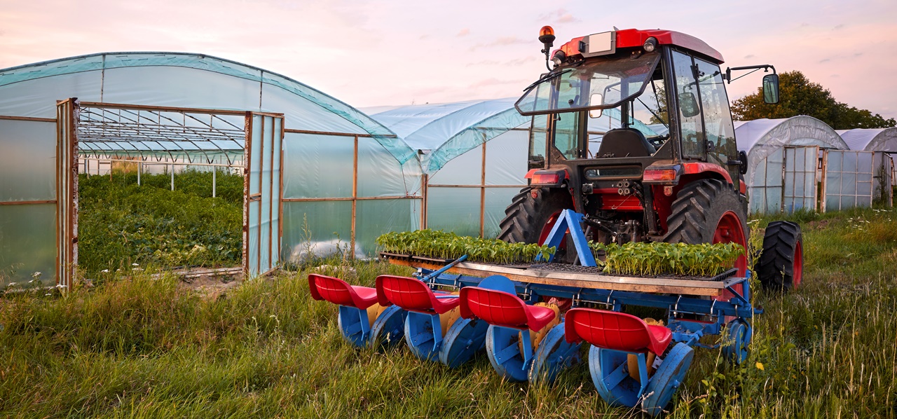 A harvesting tractor on a farm