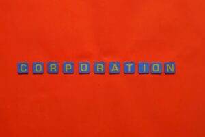 A word corporation spelled using letter tiles symbolizing limited liability company  in the Philippines