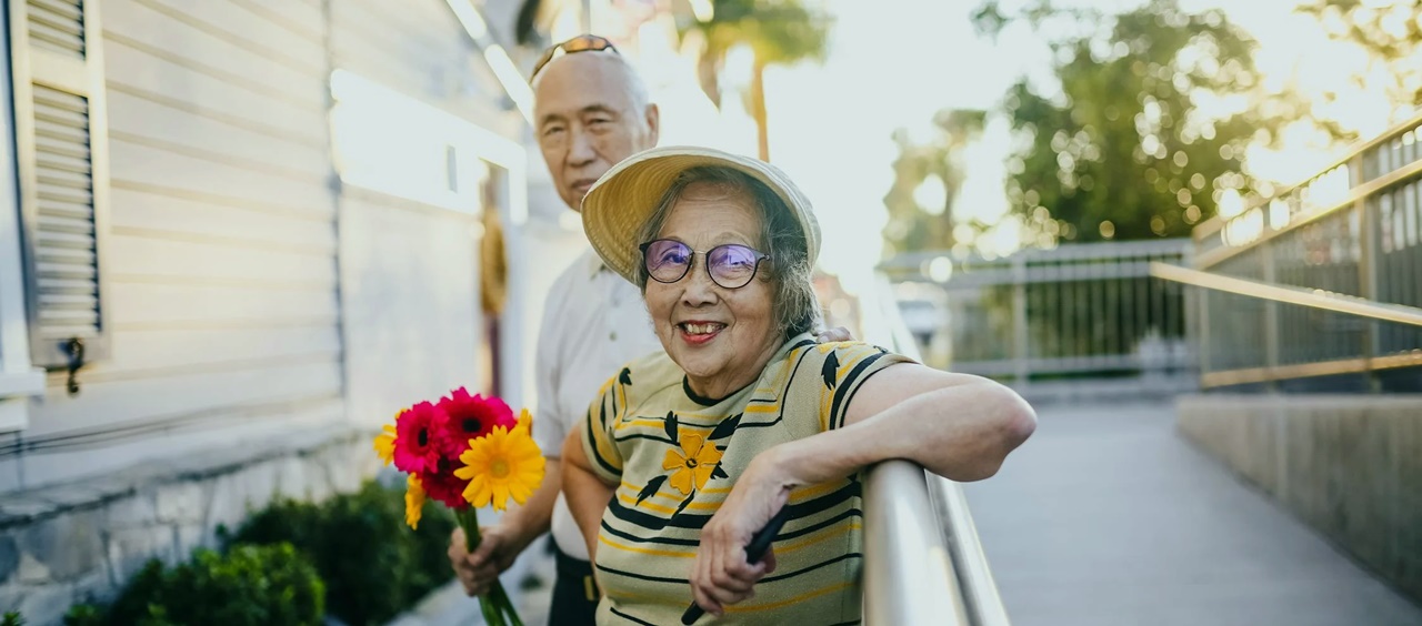 An old couple smiling at the camera after successfully getting SRRV in the Philippines